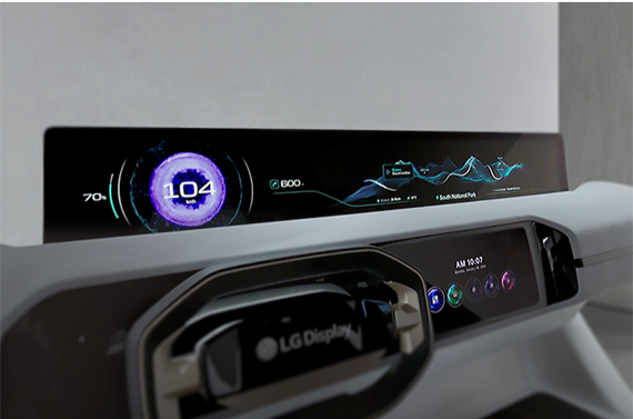 On the right side of the steering wheel with the LG Display logo, you can see the digital instrument panel with Automotive OLED, which displays speed and driving information with colorful graphics on the screen above the steering wheel.